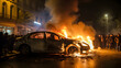 Car caught fire at night during the protests