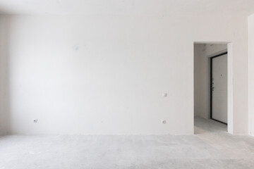 interior of the apartment without decoration in gray colors. rough finish