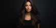© theevening - Young beautiful woman long hair with dressed in a black t-shirt.