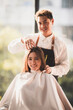 © chokniti - client woman clean washing a hair in salon, professional hairdresser washing haircut customer hair with water and shampoo treatment, coiffure beauty head hair care, fashion service