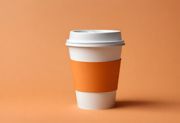 Wall Mural - Paper coffee cup mockup with blank space and isolated orange background