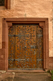Fototapeta Na ścianę - Old, decorated door with a knocker
