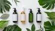 Cosmetic set of blank label bottles for packaging mockups of cream, serum, conditioner, perfume on white background with green leaves, Organic natural cosmetic products