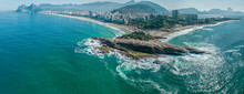 Aerial View Of Diabo Beach And Ipanema Beach, Pedra Do Arpoador. People Sunbathing And Playing On The Beach, Sea Sports. Rio De Janeiro. Brazil
