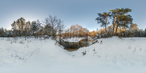 Wall Mural - winter full spherical hdri 360 panorama view road in snowy forest near river with blue evening sky in equirectangular projection. VR AR content