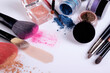 Professional cosmetics and brushes for make-up on a white background