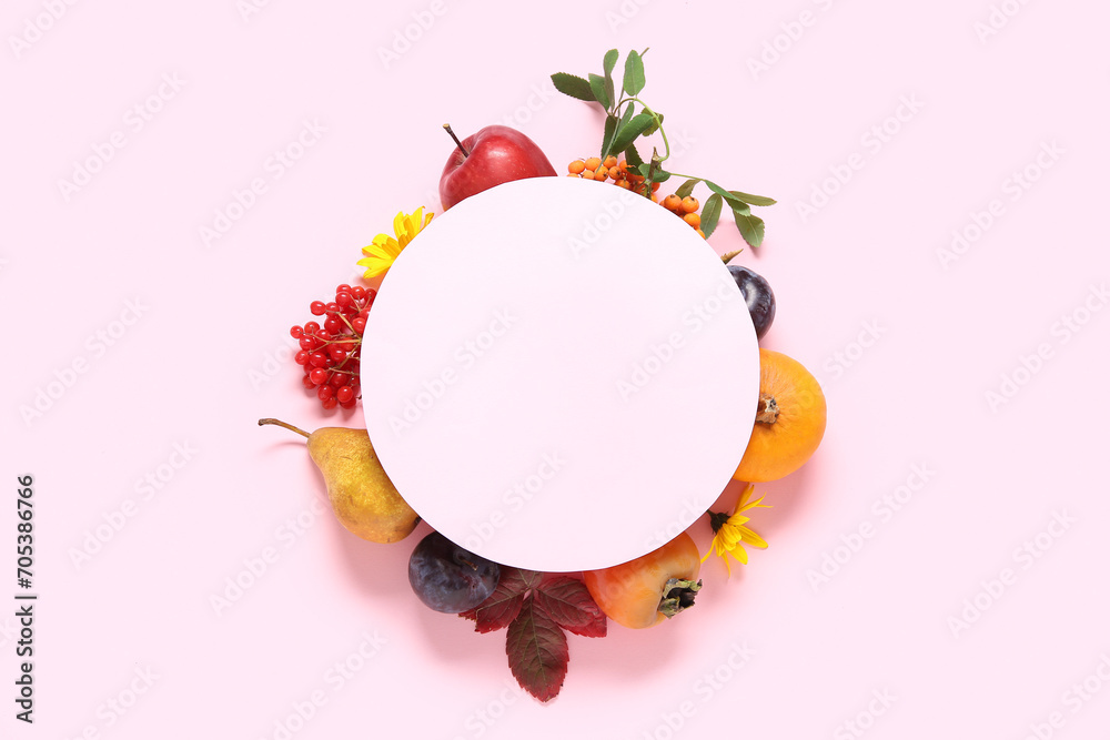 Composition with blank card and different fruits on pink background