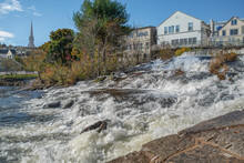 Historic New England Dam:  Water Cascades Over A Rocky Spillway Beneath Montgomery Dam At Camden, Maine.
