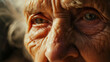 Elderly woman's eyes reflecting a lifetime of stories.
