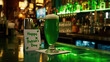 Happy St. Patrick's Day inscription on a piece of paper next to a glass of green beer in a bar, Irish national holiday, traditional drink, note, restaurant, Ireland