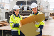 © chokniti - Professional worker team in safety uniform, supervisor inspector in packaging stock order at cardboard factory warehouse, piles of stacking paper manufacture, recycling industrial production