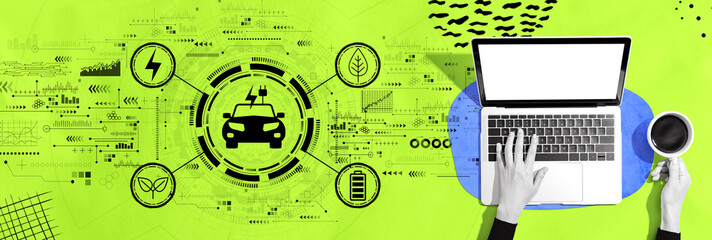Poster - EV concept with person using a laptop computer