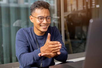 close up employee indian man hand gesture about stop sign language to teaching or assist colleagues from meeting in office room for business lifestyle concept