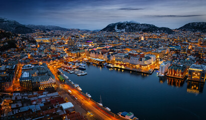 Wall Mural - Panoramic aerial view of the illuminated cityscape of Bergen, Norway, during a cold winter night