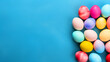 © DesiArt - Group of colorful painted Easter eggs on isolated background - ai generative