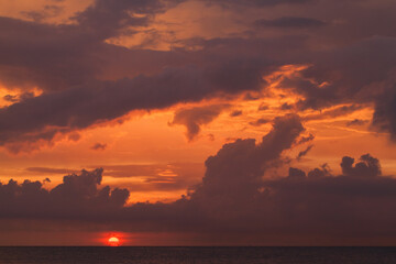 Wall Mural - red cloudy sky on a sunset, natural background
