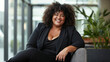 © ADDICTIVE STOCK - Confident plus-size businesswoman in modern office setting. Generative AI image