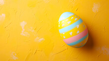 Easter Egg On A Yellow Background