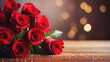 close up of red rose bouquet on a wooden desk with shiny bokeh lights with wide copy space.valentine's day concept