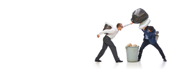 Cleaning is important. Two men with trash bins fighting isolated over white background. Concept of environment, ecology, nature care, recycling, awareness. Banner. Empty space to insert text