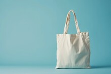 White Tote Bag Without Words Isolated On Light Blue Background. Mock Up