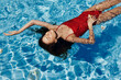 Woman bikini pool summer blue water vacation lifestyle female beauty body