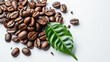 Coffee beans with green leaves on white background , top view , flat lay