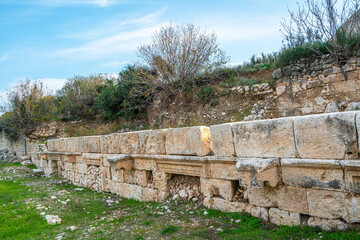 Elaiussa Sebaste or Elaeousa Sebaste was an ancient Roman town in Mersin, was founded in the 2nd century BC on a tiny island attached to the mainland by a narrow isthmus in the Mediterranea Sea.