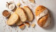 sliced bread on white background crumbs and fresh bread slices close up bakery food concept top view