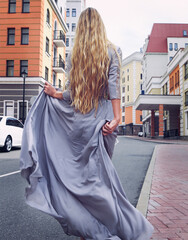 Young beautiful blond woman with long hair