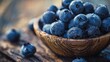 Dew-kissed blueberries in a rustic bowl capture the essence of simple, wholesome food.