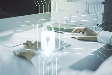 Poster - Double exposure of creative lock hologram with chip and hands typing on laptop on background. Information security concept