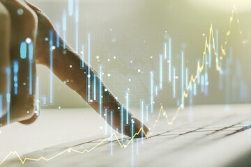 Poster - Abstract creative financial graph with hand typing on laptop on background, financial and trading concept. Multiexposure
