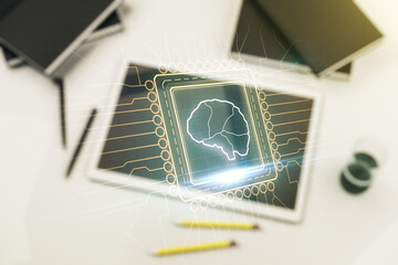Poster - Creative artificial Intelligence concept with human brain hologram and modern digital tablet on background, top view. Multiexposure