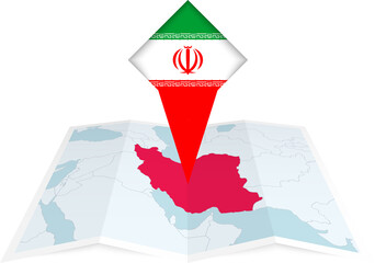 Wall Mural - Iran pin flag and map on a folded map