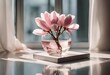Beautiful pink magnolia flower in transparent glass vase standing on white table sunlight on pastel table