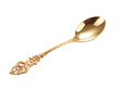 a gold spoon with a floral design