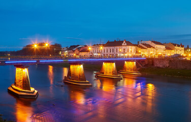 Canvas Print - Illuminated pedestrian bridge in the center of Uzhgorod