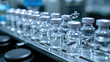 © B & G Media - A view of a pharmaceutical production line at work, featuring medical vials and glass bottles, with pharmaceutical machines in operation.