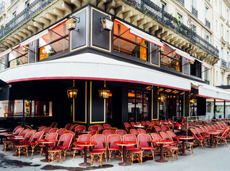 Wall Mural - cozy street with tables of cafe in paris, france. architecture and landmark of paris. cozy paris cit