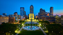 Aerial Twilight View Of Indiana War Memorial With Fountain And Cityscape