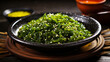 seaweed salad on black plate