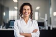 © aicandy - A Professional Portrait of a Confident Female Dentist, Dressed in White Lab Coat, Smiling Warmly, Standing in Her Modern, Well-Equipped Dental Clinic