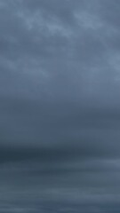 Wall Mural - dramatic sky with storm cloud on a cloudy day time lapse.