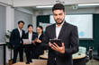 © Nopphon - Asian business people team analyzing statistics financial. Team of businesspeople Meeting Conference Discussion Corporate Concept in office.