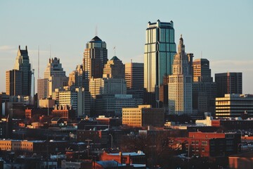 Poster - A view of a city with tall buildings. Perfect for urban-themed designs and projects
