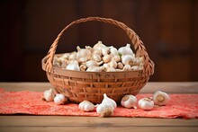 Basket Of Fresh Garlic Bulbs And Cloves