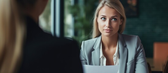 Canvas Print - Skeptical HR manager dissatisfied with female applicant's resume, failed interview reveals scam in hiring process.