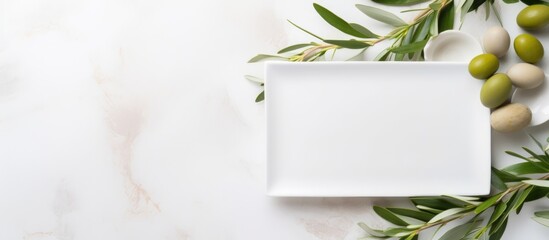 Sticker - Wedding table with decorated plates and olive branches, modern template with blank paper card. Copy space.