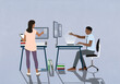 © fStop - Business people working with virtual reality and computers at desks in office